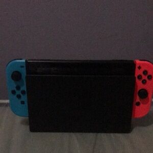 Nintendo Switch with Blue and Red Joy-Con